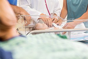 Doctor examining newborn baby