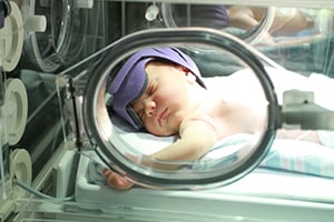 Baby on incubator